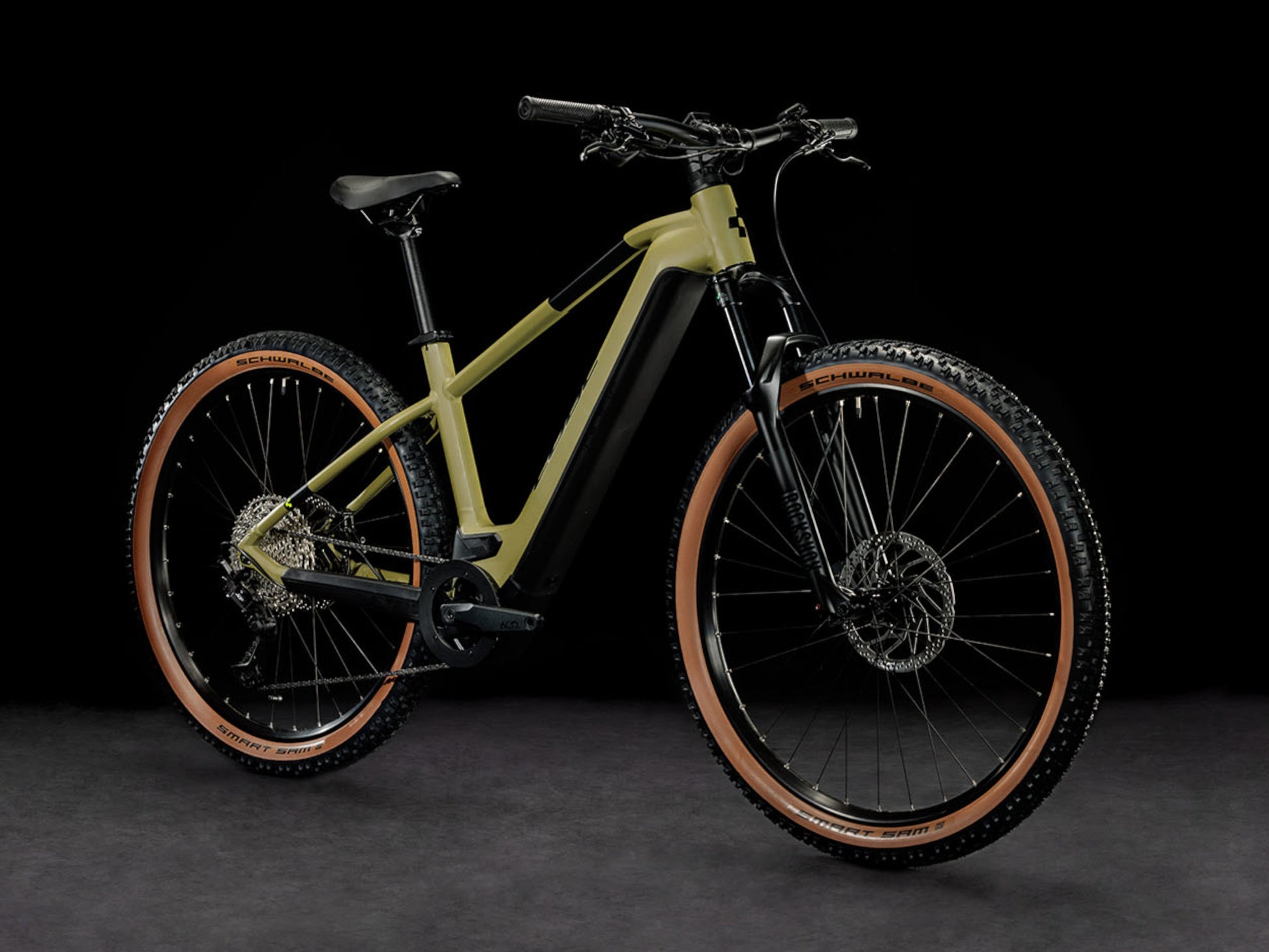 Cube Reaction Hybrid Race 625 eMTB hardtail olive n green front right side profile on Fly Rides