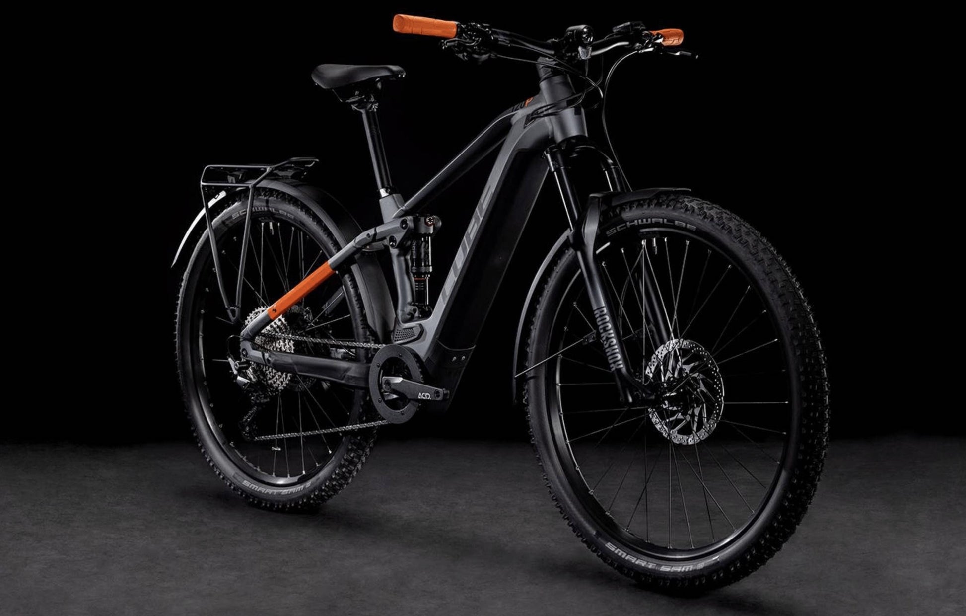 Cube Stereo Hybrid 120 Pro Allroad 625 electric mountain bike flashgray and orange front quarterview on fly rides