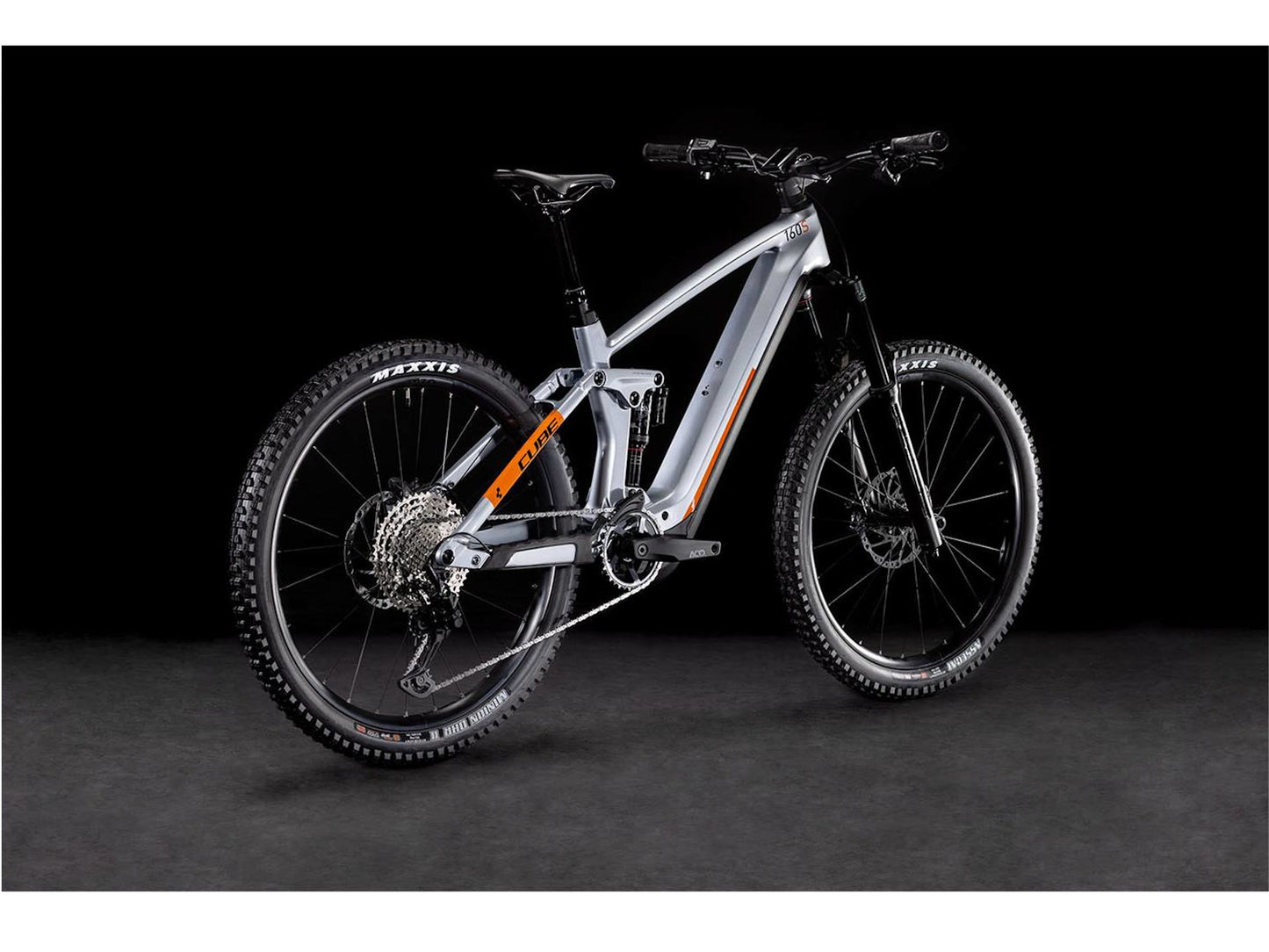 Cube Stereo Hybrid 160 HPC SL electric bike polarsilver and orange rear quarterview on Fly Rides